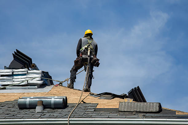 Professional Roofing technician working in Bloomingdale, NY
